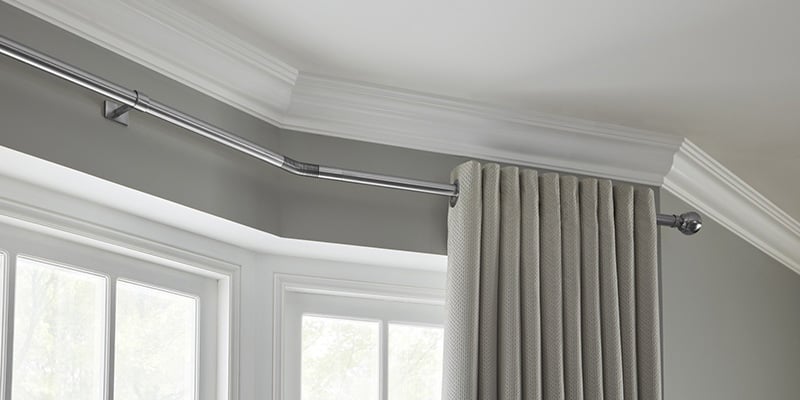 How to Fit a Bay Window Curtain Pole